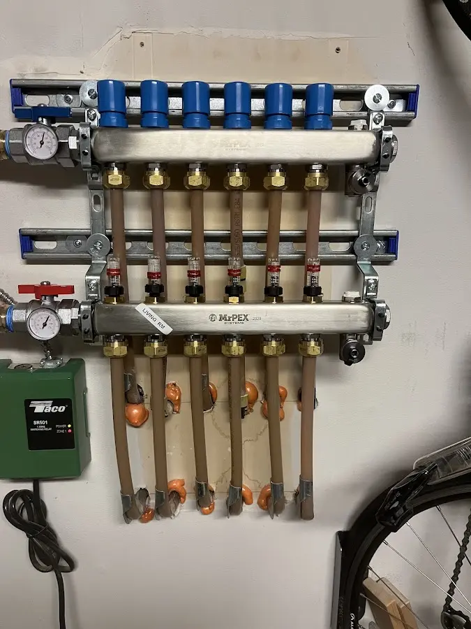 Plumber performing Water Heater Repair at a residential property in Live Oak